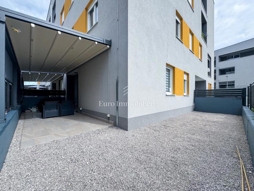 Stanovanje v Pritličju s Prostorno Teraso in Vrtom