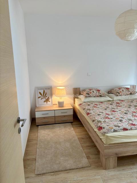 Dvosobni apartma z vrtom, 150 m od plaže