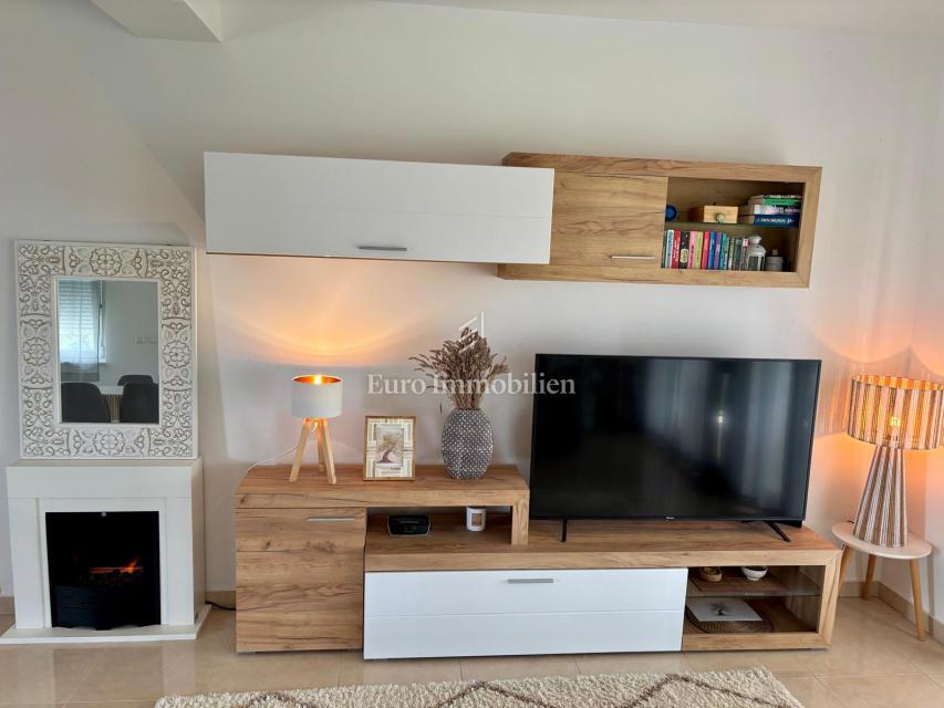 Dvosobni apartma z vrtom, 150 m od plaže