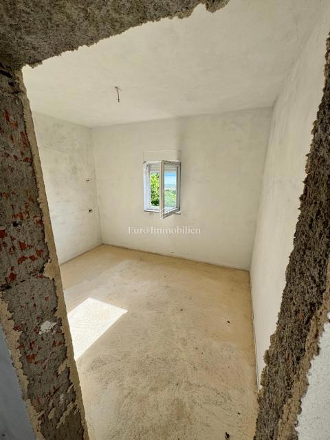 Okolica mesta Krk - hiša s pogledom na morje