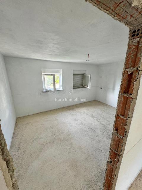 Okolica mesta Krk - hiša s pogledom na morje