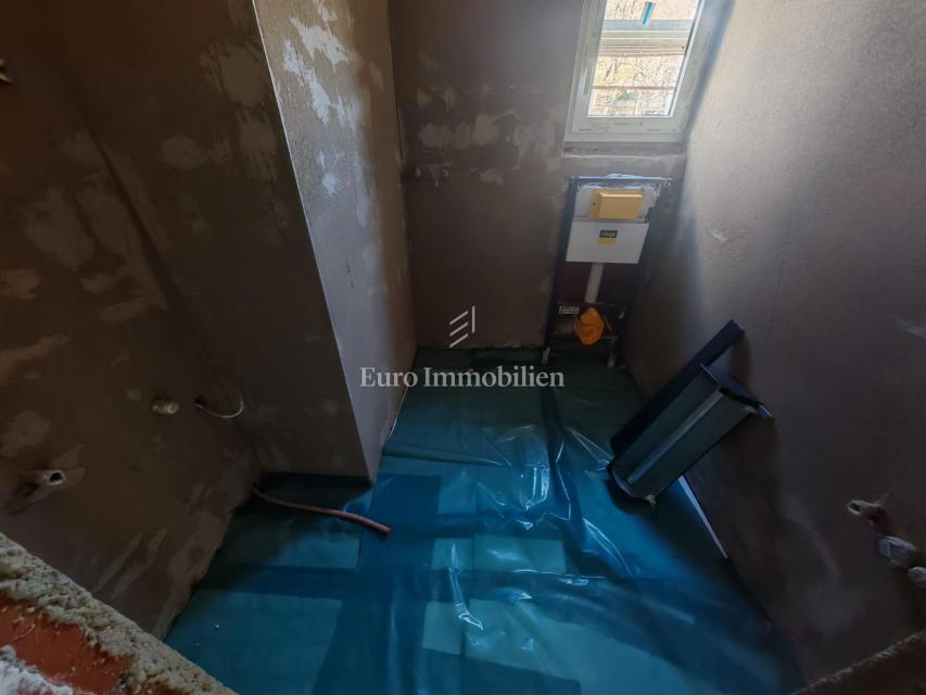 Stanovanje v novi stavbi s pogledom na morje