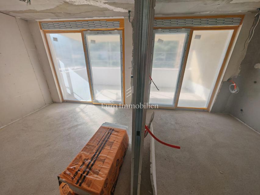 Dvosobno stanovanje v novogradnji v pritličju