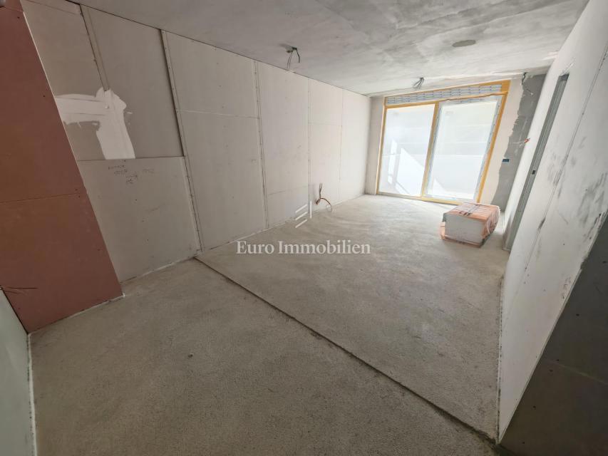 Dvosobno stanovanje v novogradnji v pritličju