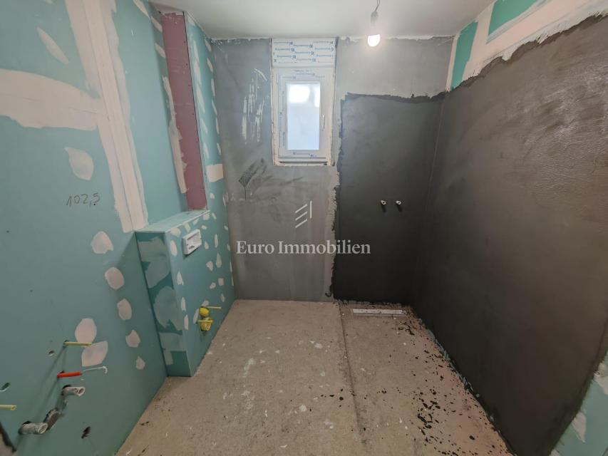 Dvosobno stanovanje v novogradnji v pritličju