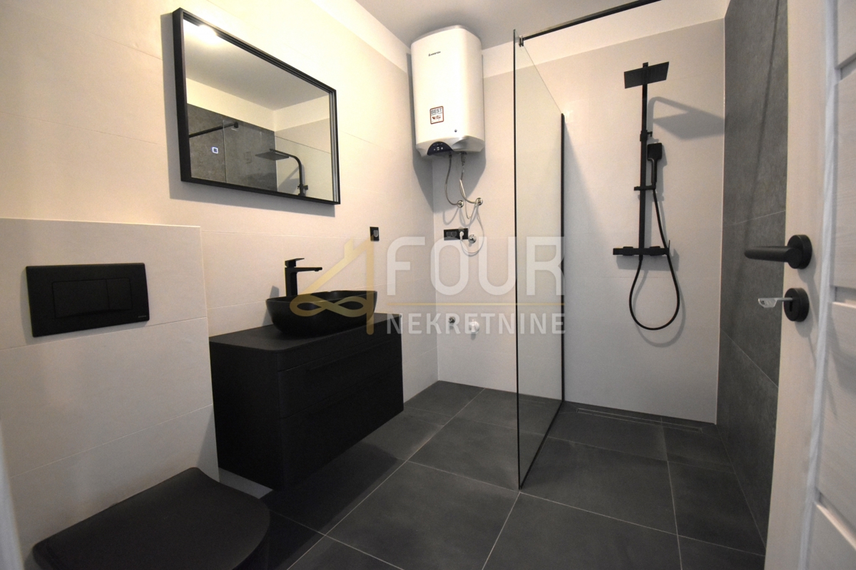 Otok Krk, Čižići, novogradnja, 2s+db, terasa + vrt