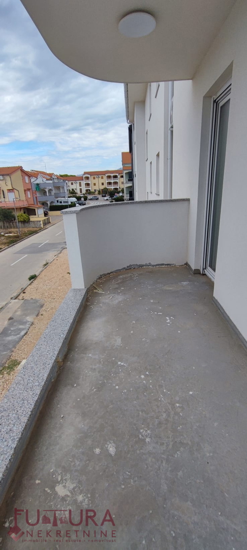 PAG - POVLJANA, PRODAJA STANOVANJA 54,52 M2, RAZGLED, 50 M OD MORJA, NOVO!!!
