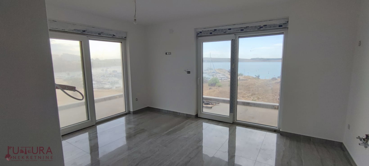 PAG - POVLJANA, PRODAJA STANOVANJA 54,52 M2, RAZGLED, 50 M OD MORJA, NOVO!!!