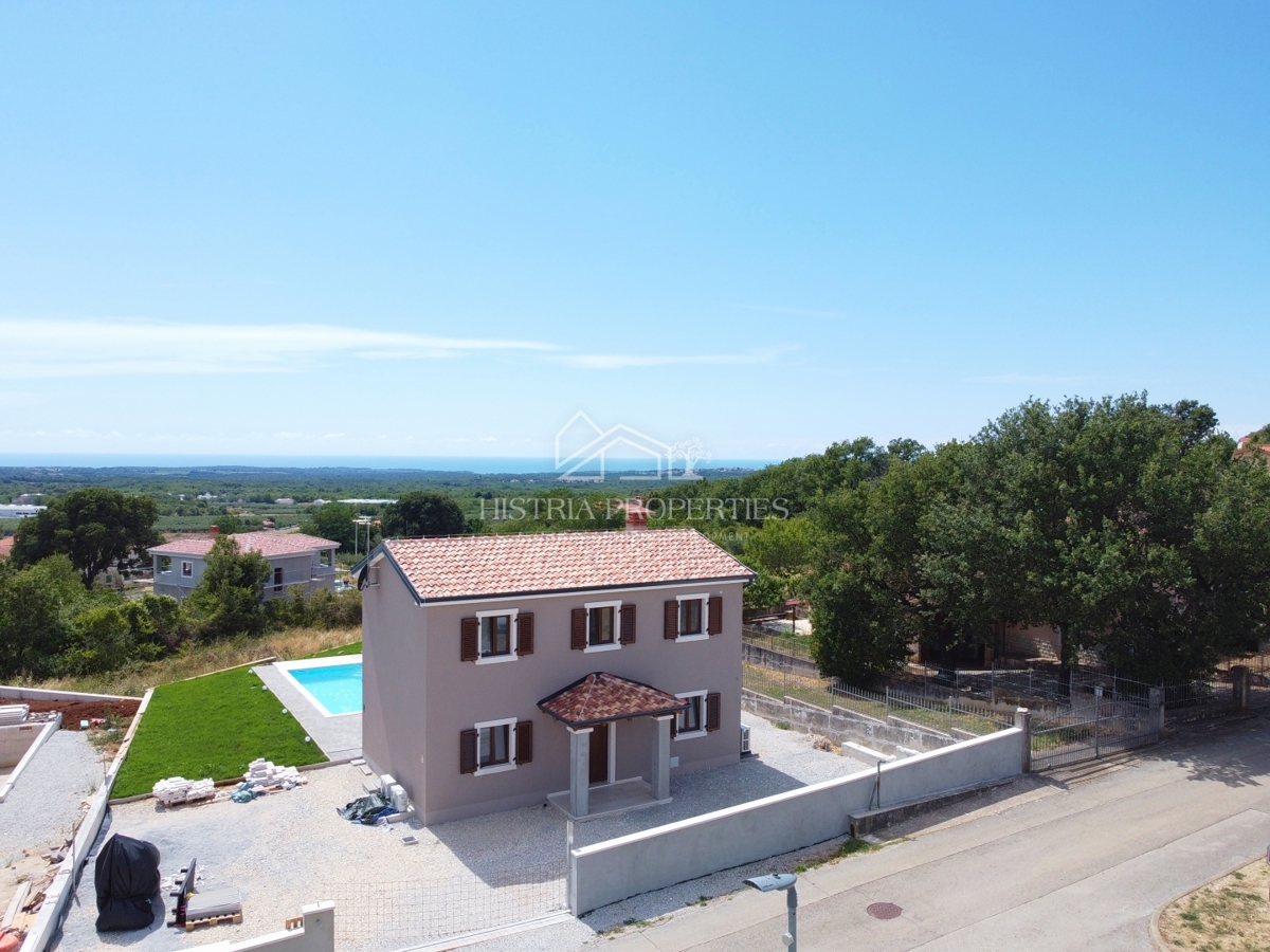 Casa con dettagli istriani riconoscibili e una splendida vista sul mare