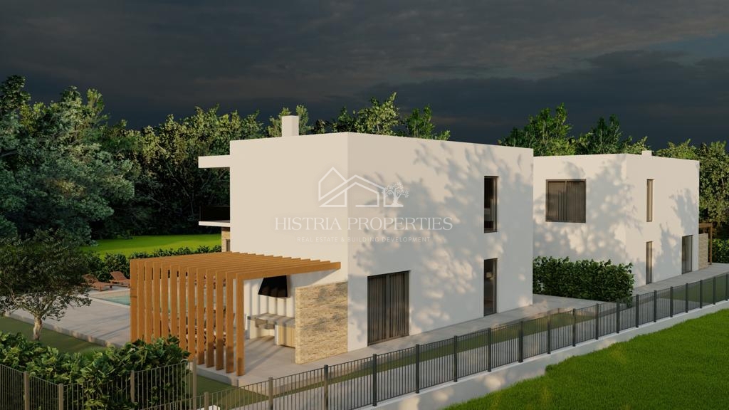 Gradbeno zemljišče za 2 moderni hiši z veljavnim dovoljenjem in plačanimi komunalnimi storitvami