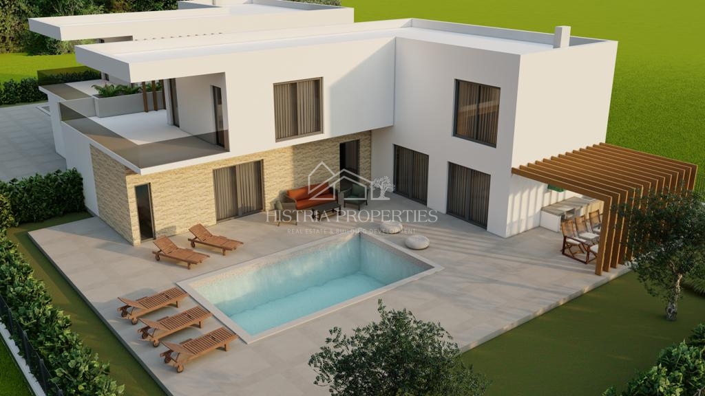 Gradbeno zemljišče za 2 moderni hiši z veljavnim dovoljenjem in plačanimi komunalnimi storitvami