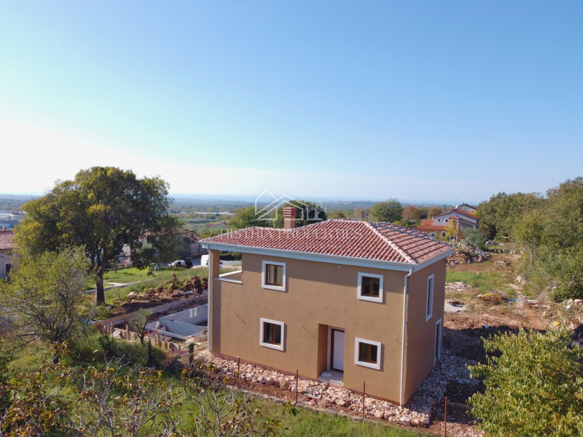 Novogradnja v tradicionalnem slogu s pogledom na morje iz vsake sobe