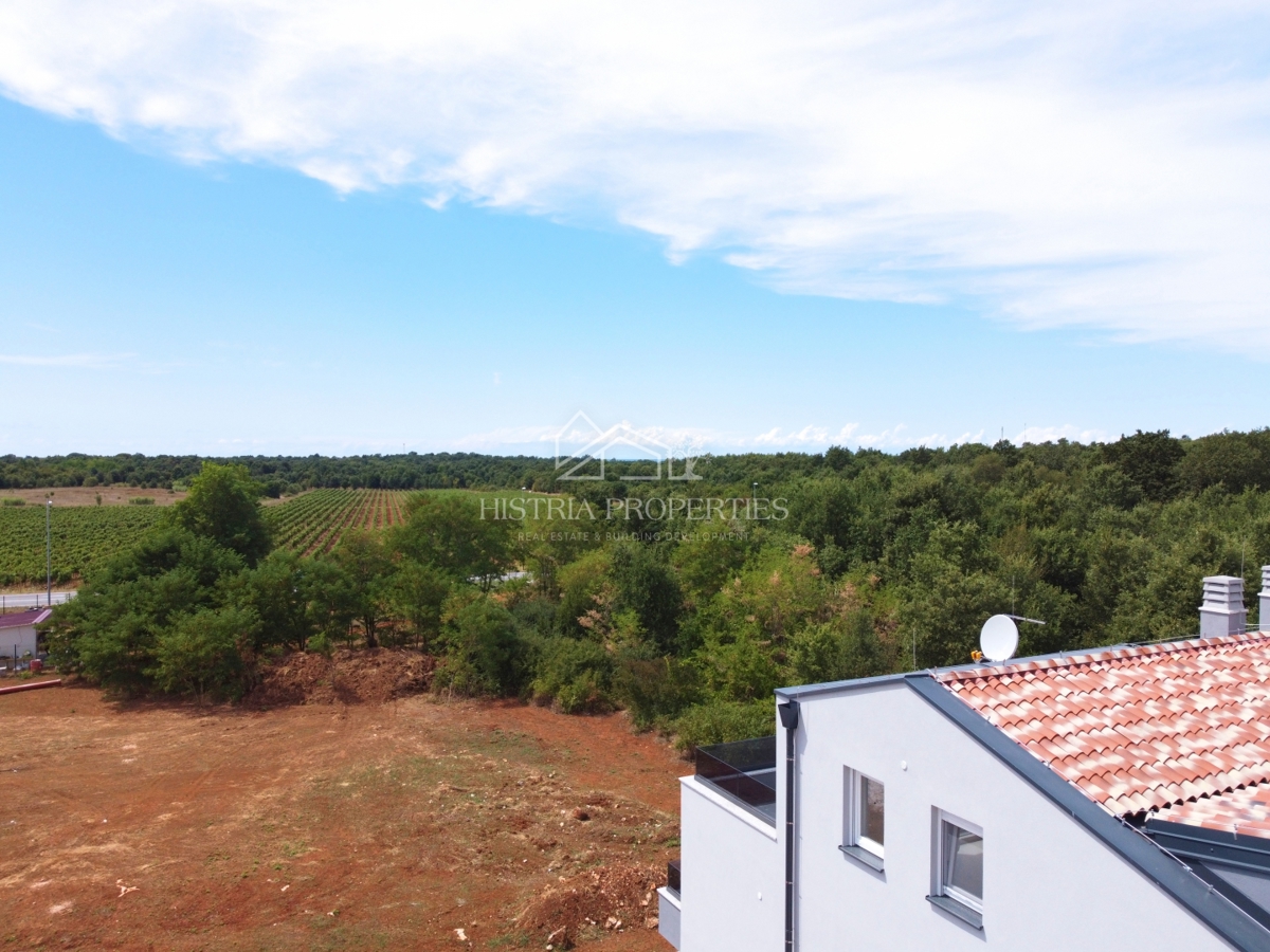 Prostorno stanovanje s teraso in čudovitim razgledom v novi stavbi