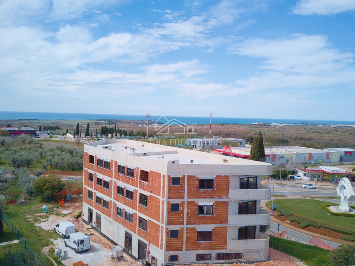 Panoramski razgled, ki traja večno, in moderno stanovanje v kakovostni novogradnji blizu morja