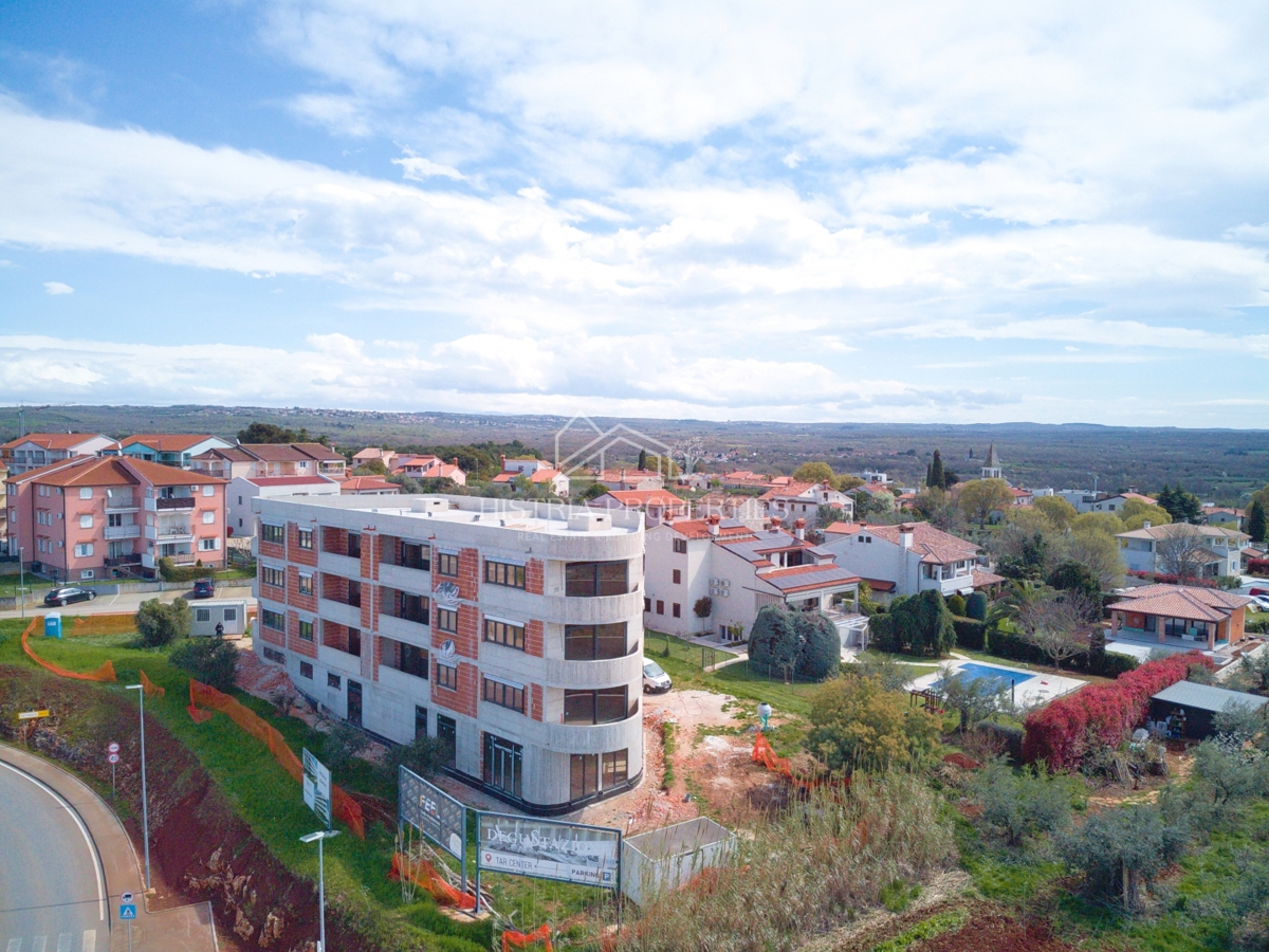 Panoramski razgled, ki traja večno, in moderno stanovanje v kakovostni novogradnji blizu morja