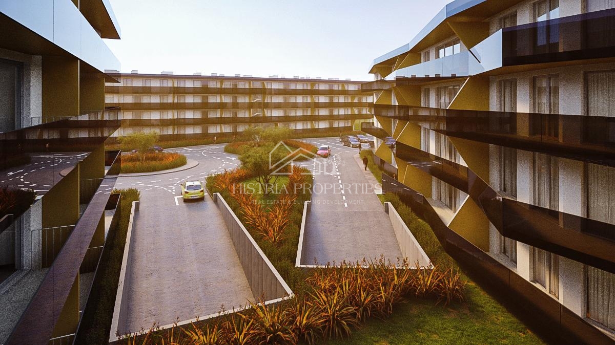 800m od morja in novo stanovanje v luksuzni novogradnji z garažo, dvigalom in pogledom na morje