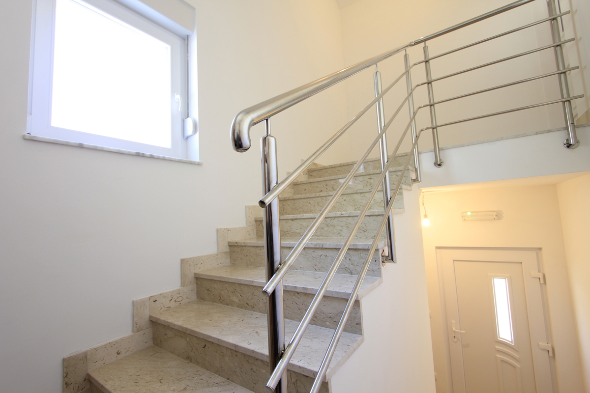 Prostorno štiriprostorsko stanovanje z vrtom - novogradnja