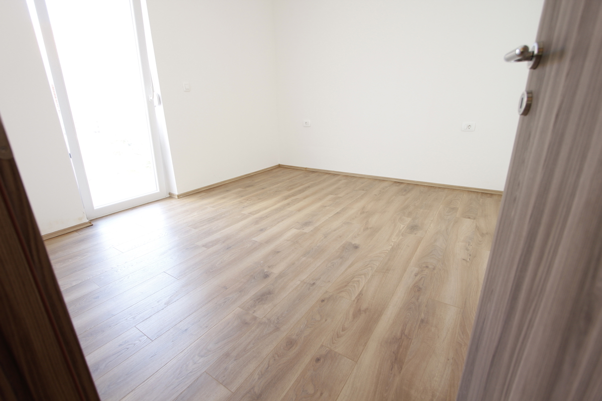 Prostorno štiriprostorsko stanovanje z vrtom - novogradnja