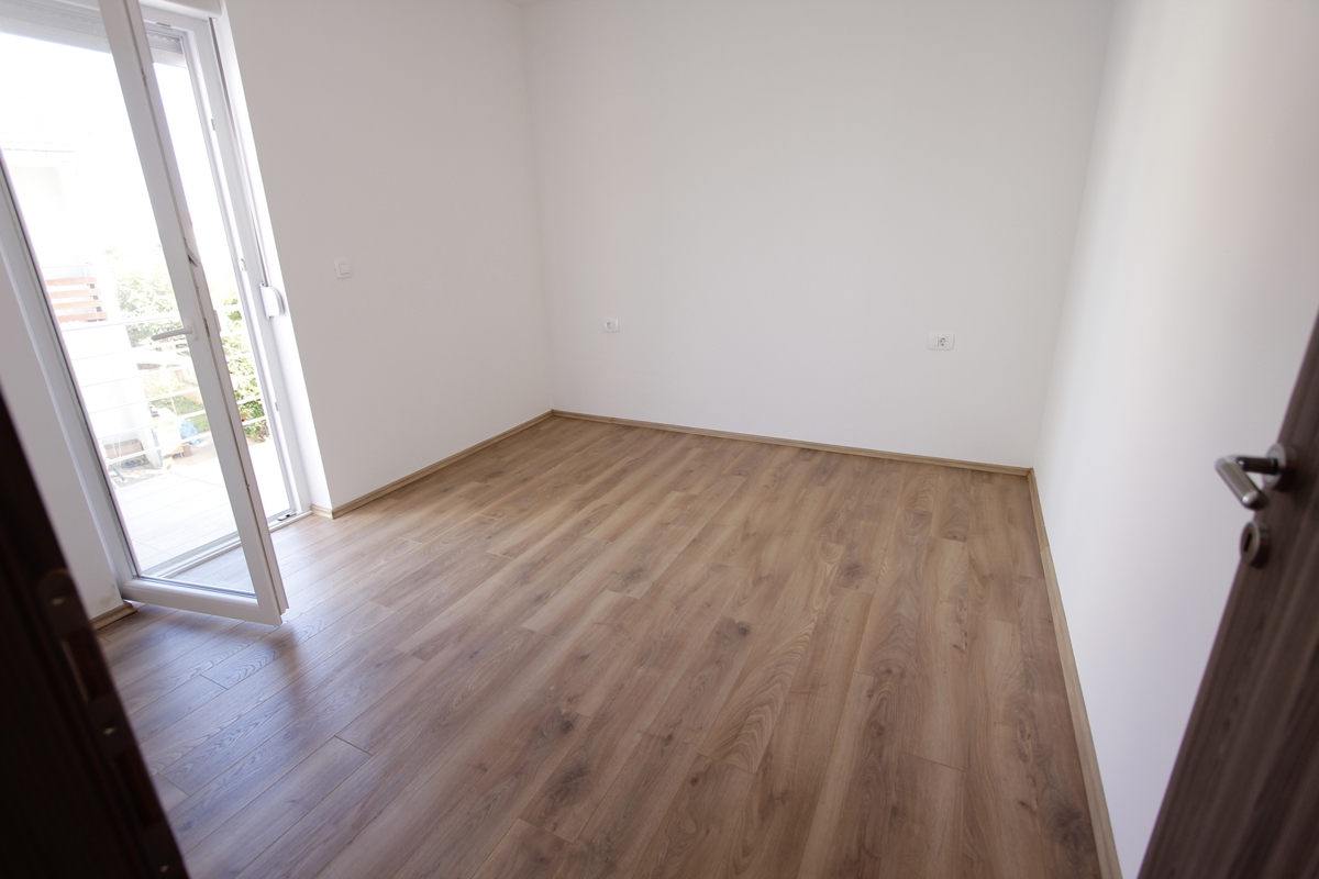 Prostorno štiriprostorsko stanovanje z vrtom - novogradnja