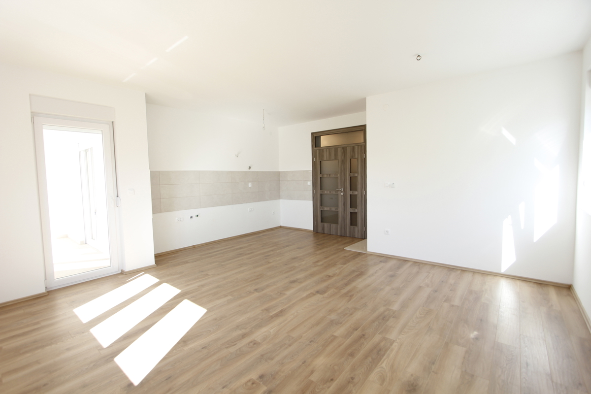 Prostorno štiriprostorsko stanovanje z vrtom - novogradnja