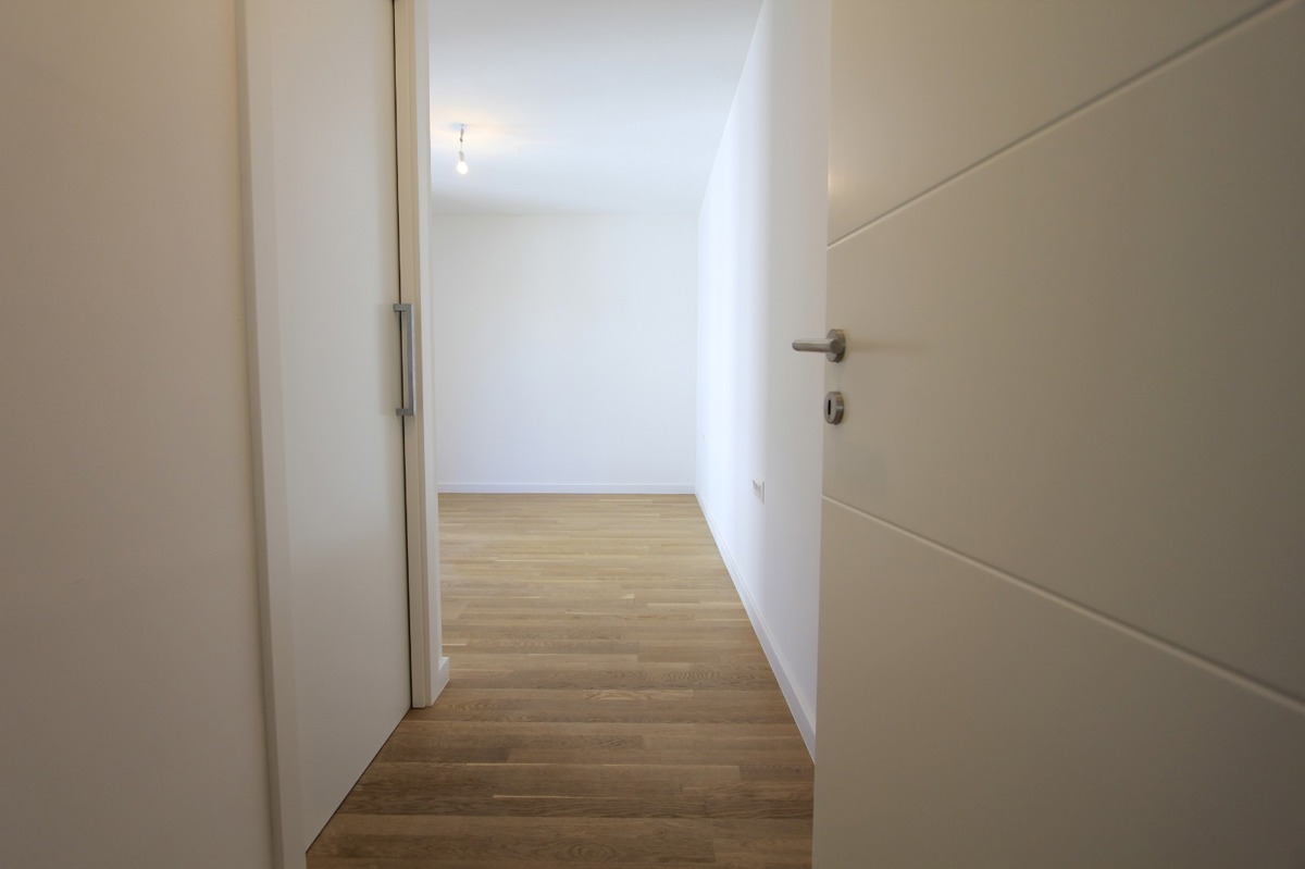 Luksuzno dvonadstropno 4,5-prostorno stanovanje z vrtno teraso in pogledom na morje