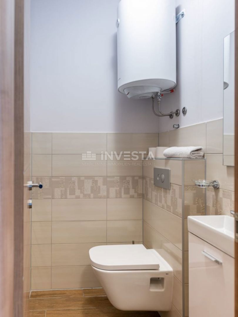Moderen apartma v prvem nadstropju, le 200 m od morja