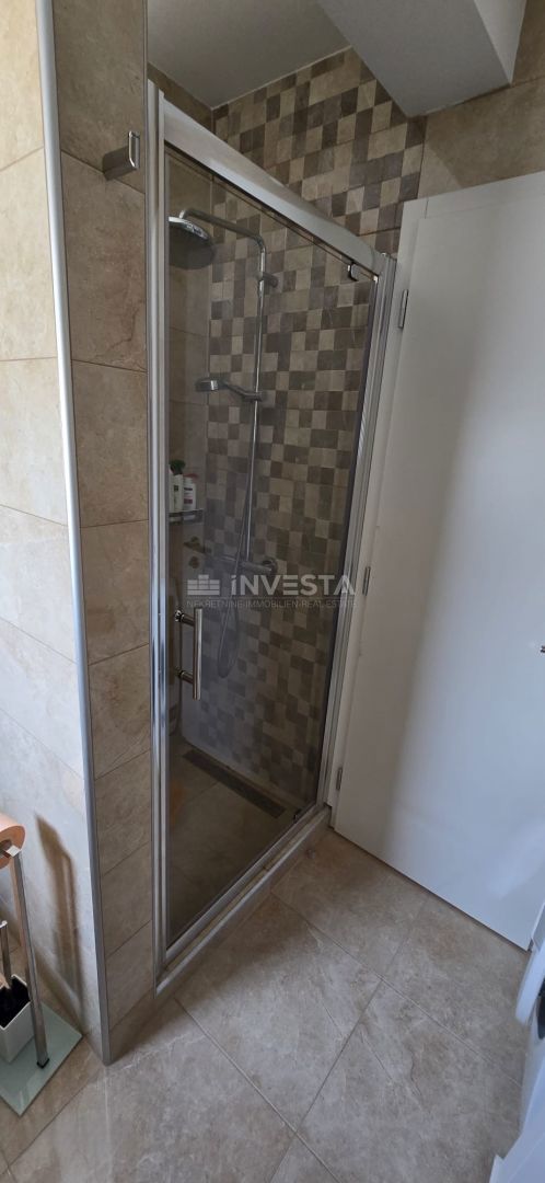 Štinjan, enosobno stanovanje v manjši stavbi z garažo