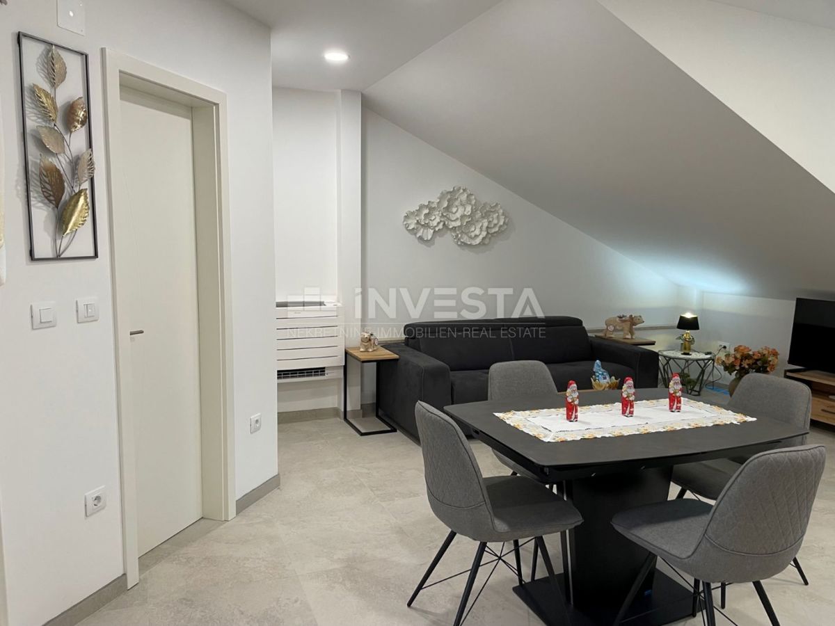 Pulj center, novo urejeno stanovanje v mansardi, 1 spalnica, balkon