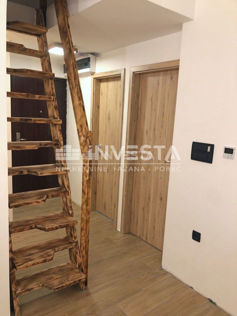 Červar-Porat, adaptirano dvosobno stanovanje z galerijo blizu morja