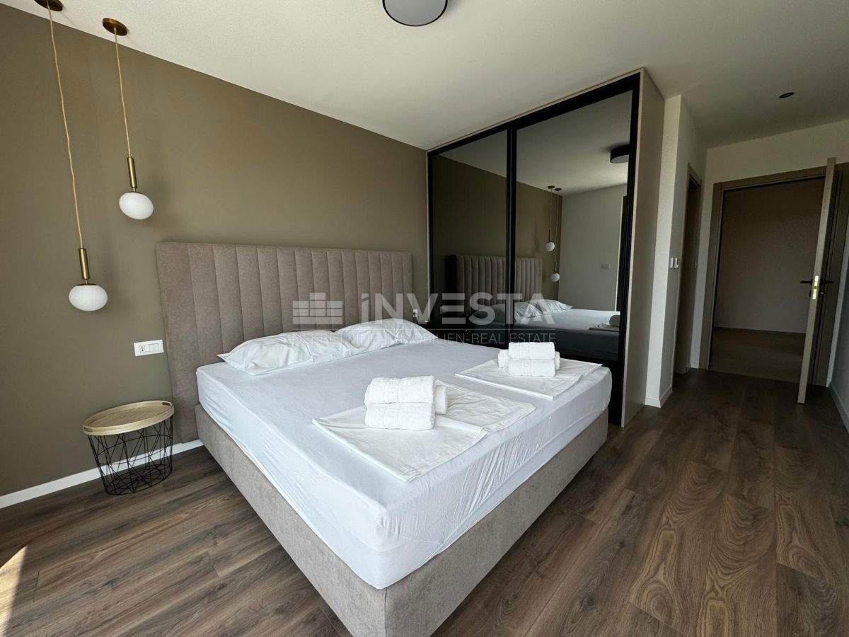 Okolica Poreča, stanovanje v 1. nadstropju novogradnje, 96 m2, pogled na morje