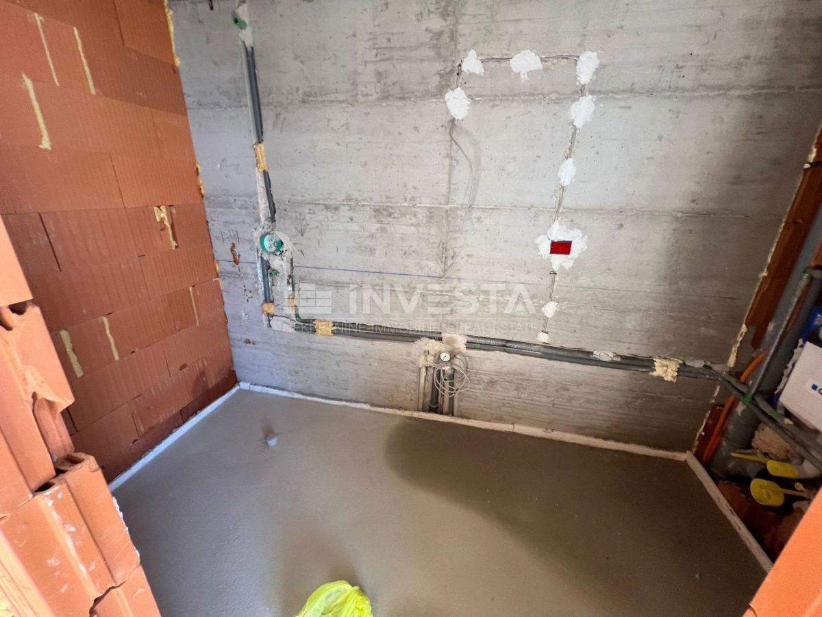 Medulin, prostorno dvosobno stanovanje v novogradnji s pogledom na morje