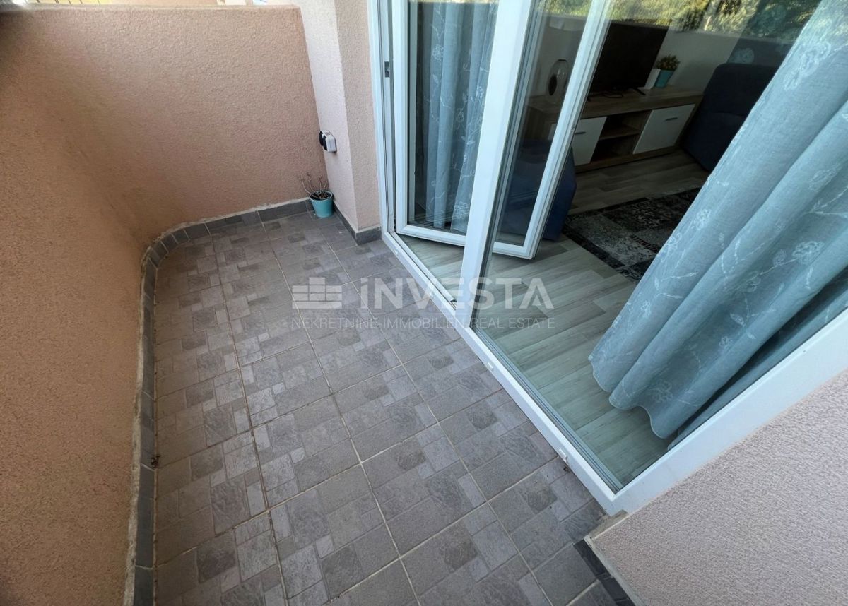 Pulj, Veli Vrh, dvosobno stanovanje z garažo na mirni lokaciji