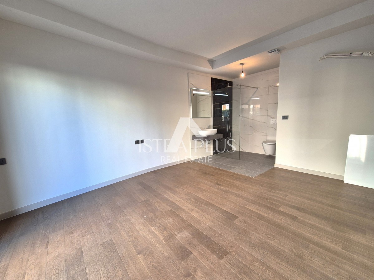 Poreč 1500m od morja - Stanovanje v pritličju z dvoriščem - moderna, kakovostna novogradnja!