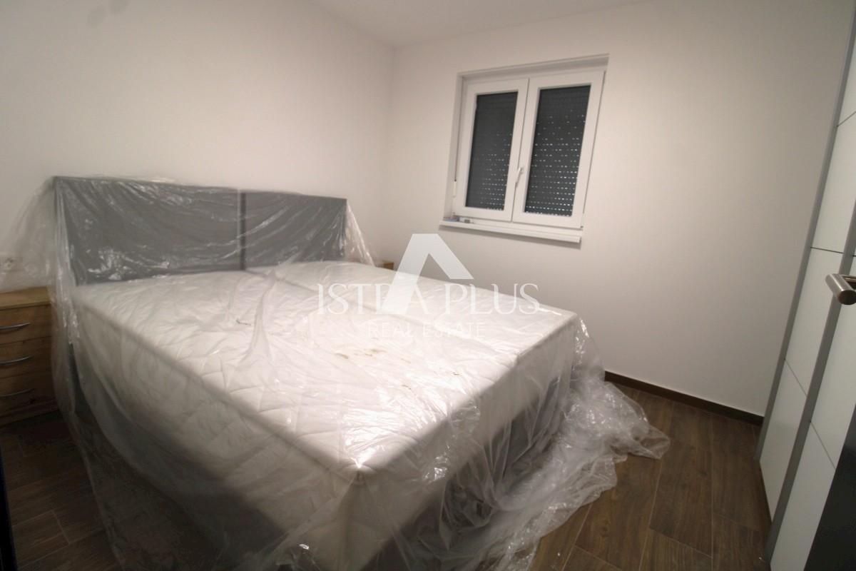 Luksuzno stanovanje s prostorno teraso, jacuzzijem in savno