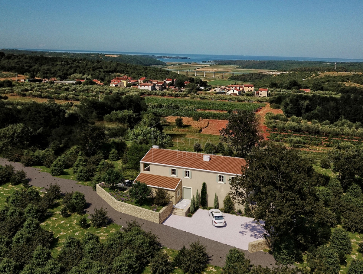 Novigrad, okolica, nova kamnita hiša s pogledom na morje