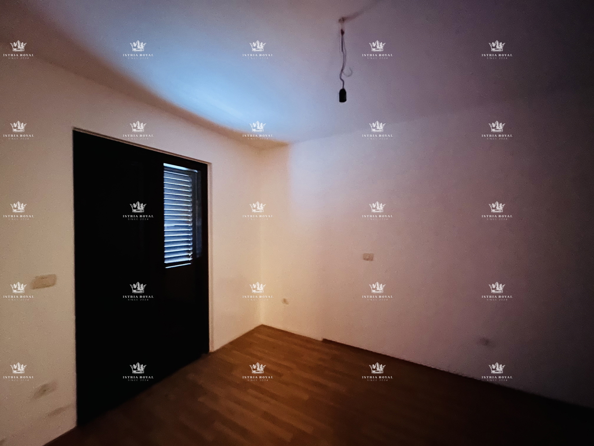 Istra, Bašanija, stanovanje 2S+DB, 63 m2, dve terasi, vrt 43 m2, miren del naselja, parkirišče