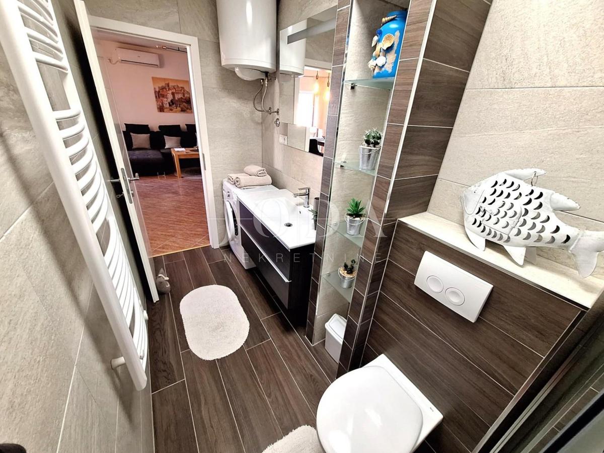 Malinska – dva stanovanja z vrtom in parkiriščem