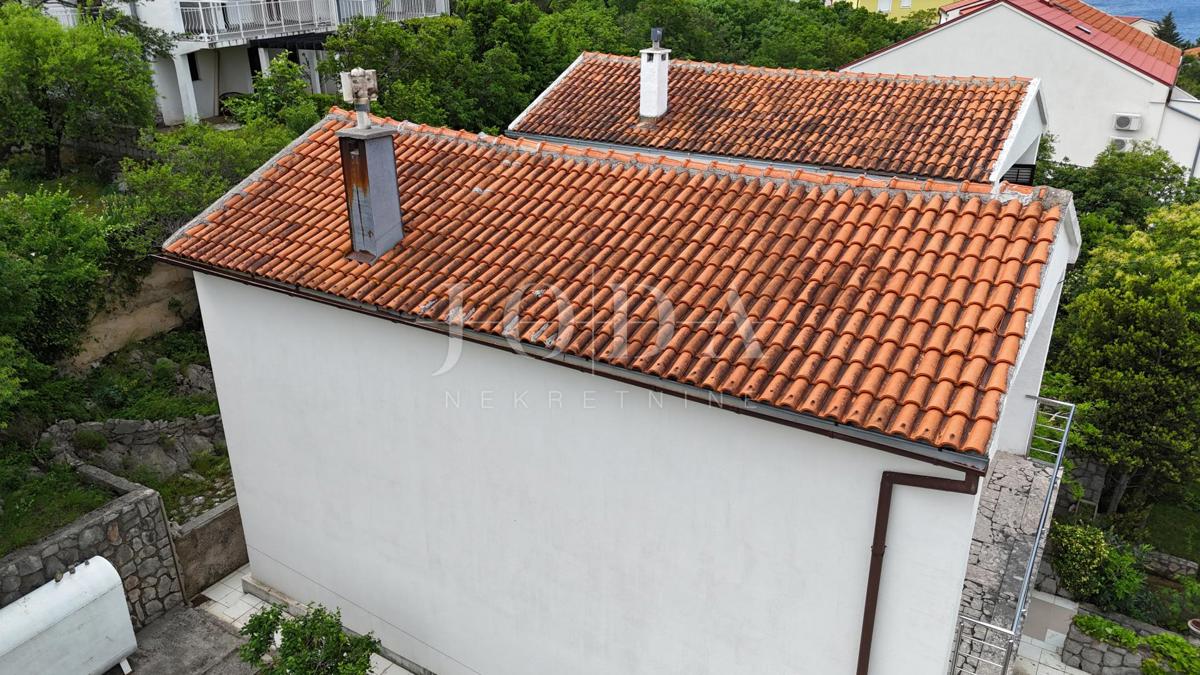 Hiša z razgledom na morje in dvema garažama – Klenovica
