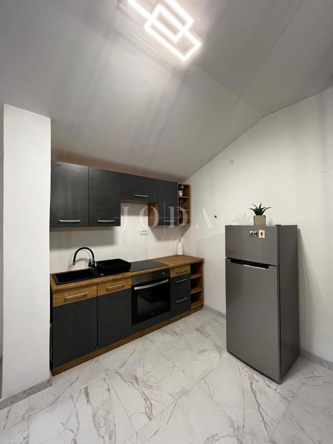 Hiša v bližini Malinske s petimi apartmaji