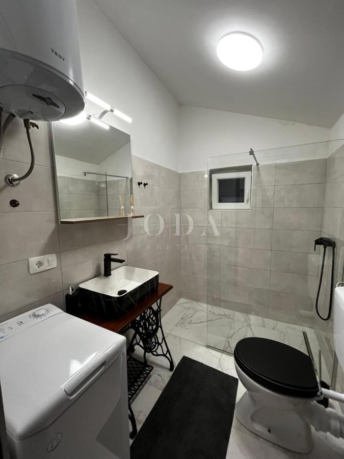 Hiša v bližini Malinske s petimi apartmaji