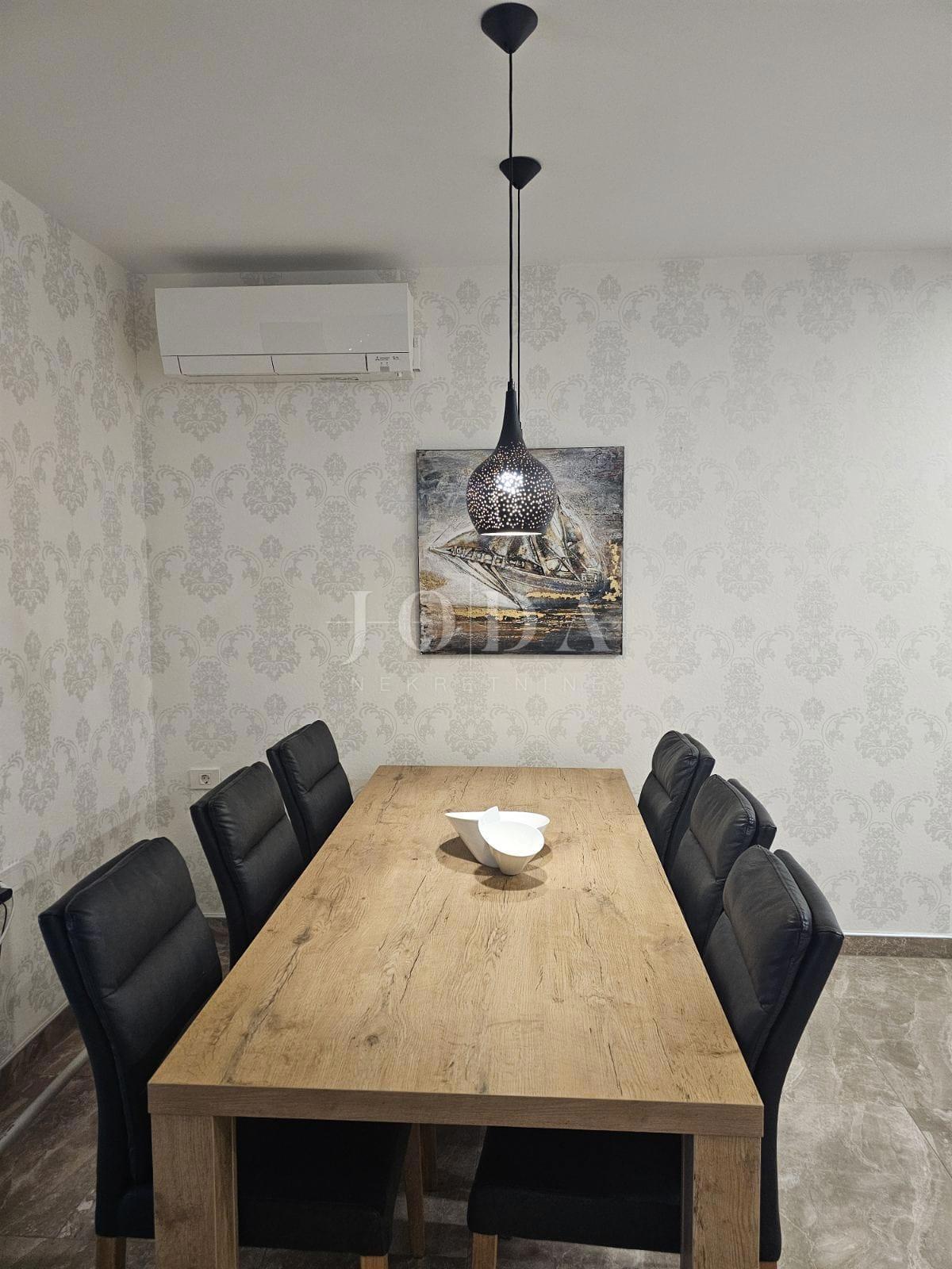 Apartma z vrtom v bližini plaže, Njivice