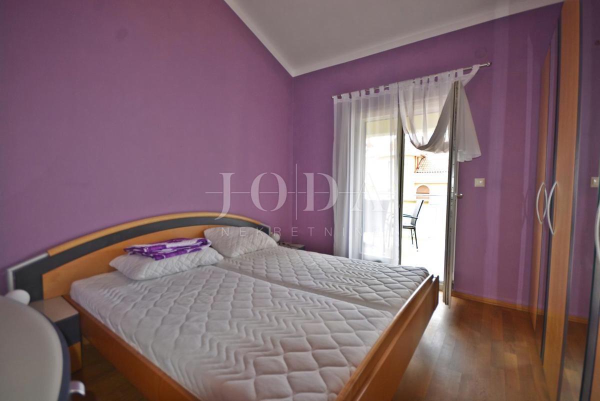 Samostojna hiša s petimi apartmaji in poslovni prostor