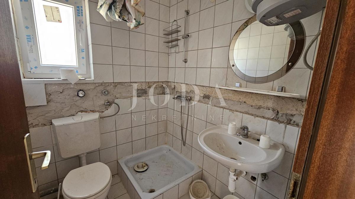 Hiša Dramalj z več stanovanjskimi enotami