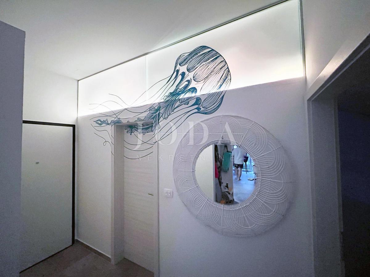 Moderno opremljeno stanovanje v pritličju z vrtom