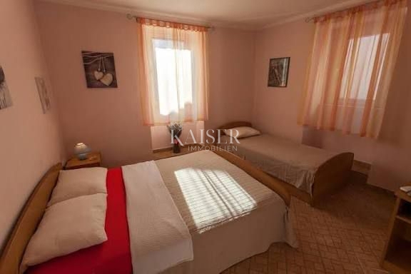 Cres, gostinski in stanovanjski objekt z restavracijo, apartmaji in sobami