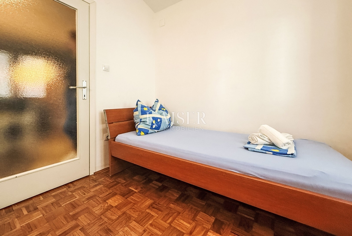 Pag, Novalja - hiša 117m2 z garažo in vrtom