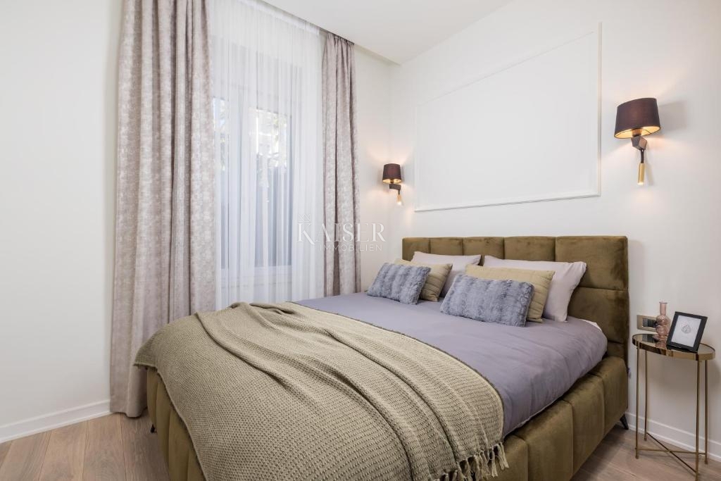 Opatija - Novo prenovljeno 2-sobno stanovanje z vrtom v centru Opatije