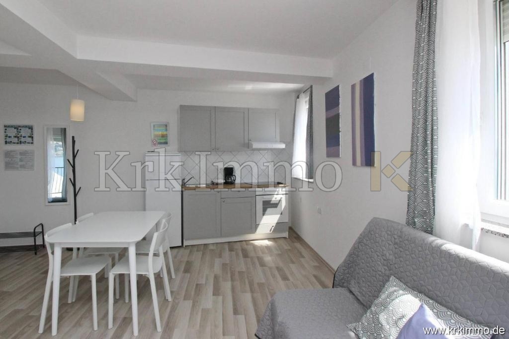 Prvi red ob morju! Moderna apartmajska hiša naprodaj