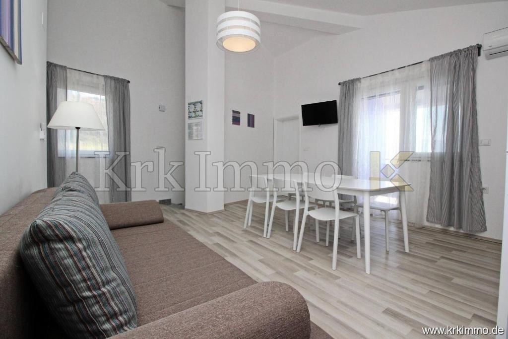 Prvi red ob morju! Moderna apartmajska hiša naprodaj