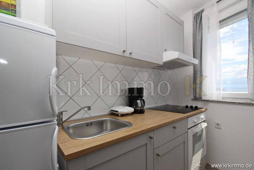 Prvi red ob morju! Moderna apartmajska hiša naprodaj